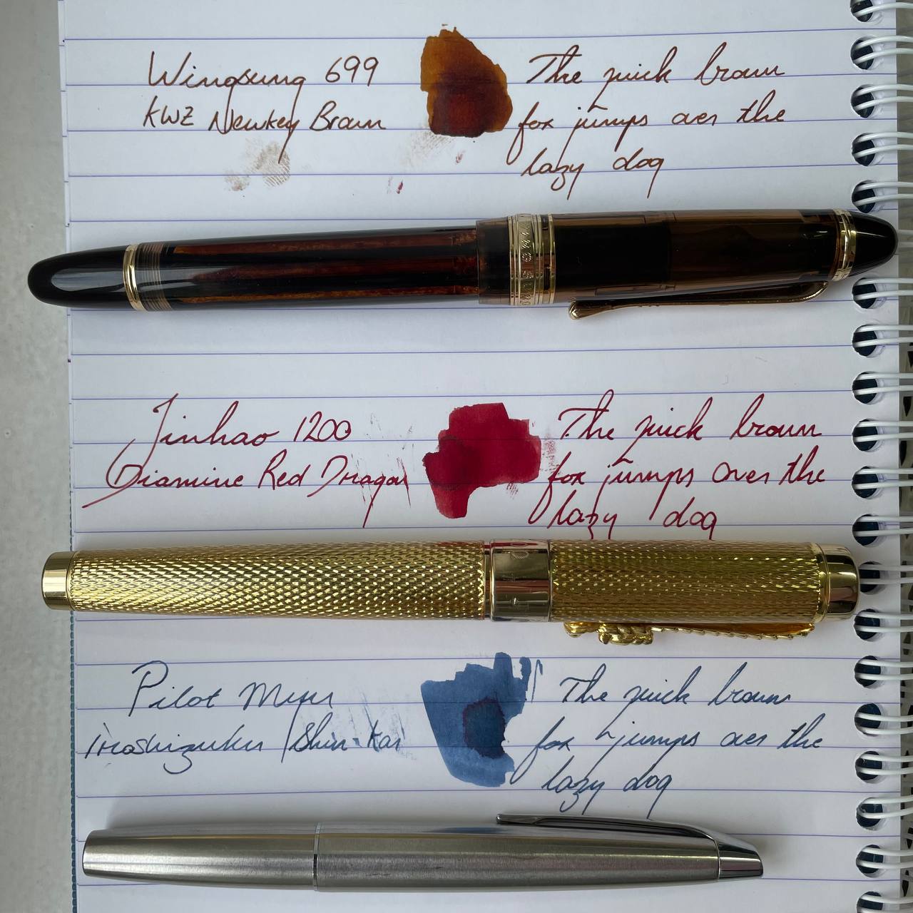 Jinhao 1200 inked with Diamine Red Dragon, Wingsung 699 inked with KWZ Newkey Brown because Newcastle won the EFL Pilot Myu inked with Iroshizuku Shin-kai 